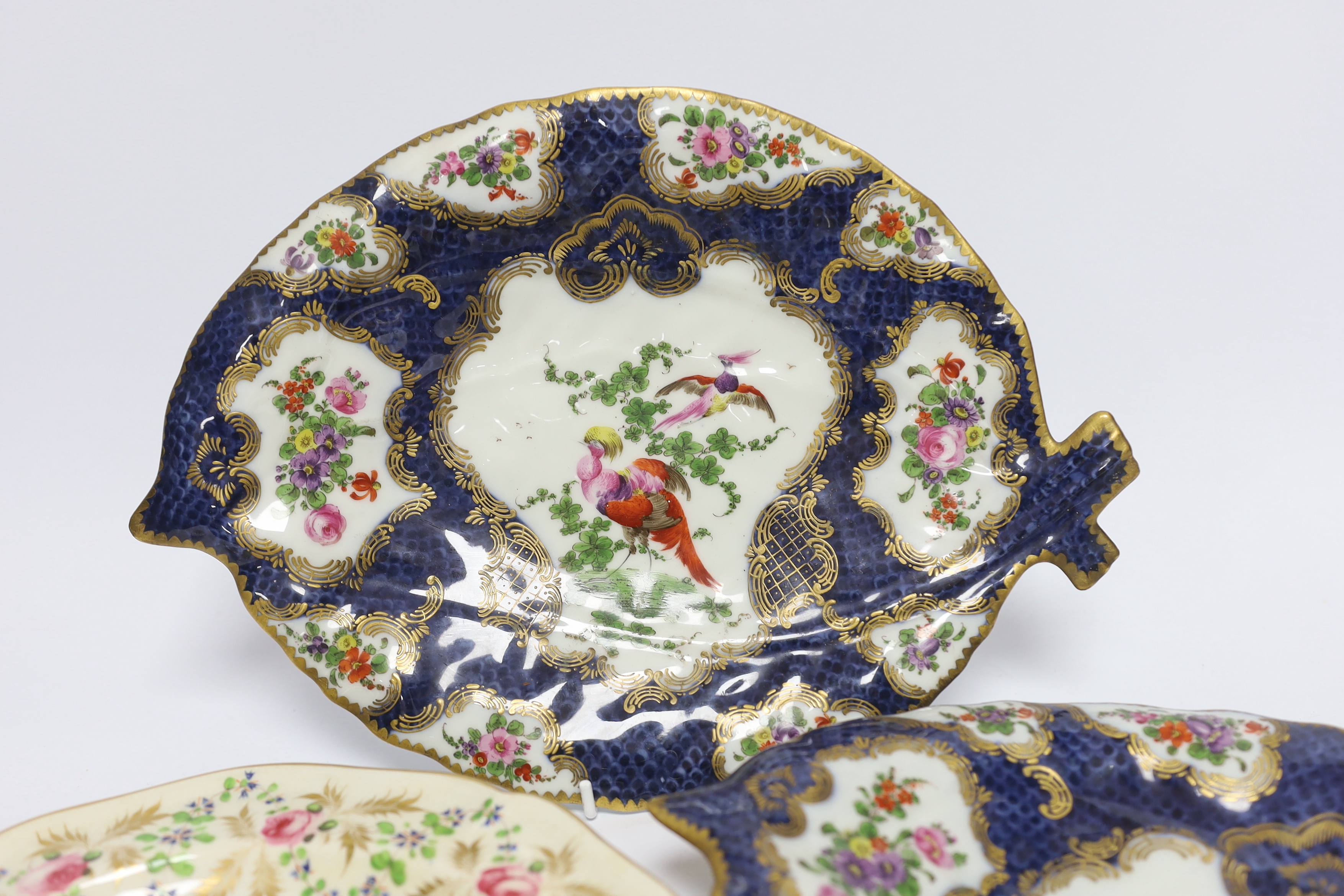 A pair of Samson Worcester style scale blue dishes, a Worcester fruit painted tea bowl and saucer, c.1780 and another teabowl together with a pair of Derby armorial plates, c.1820 and two jugs
